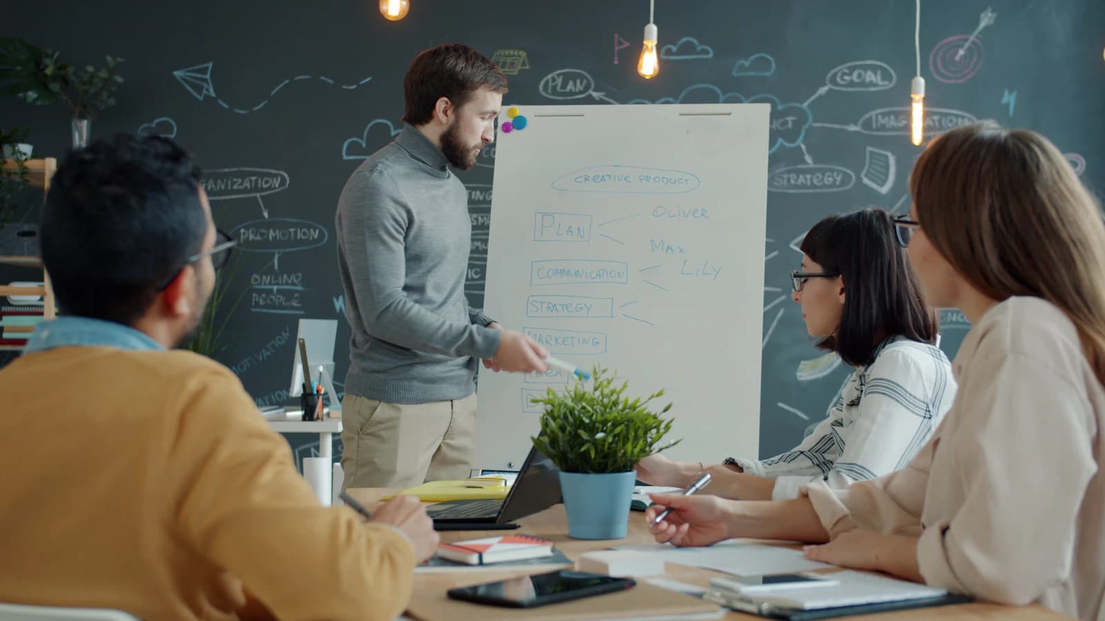 A real team collaborating — relevant to solutions by team